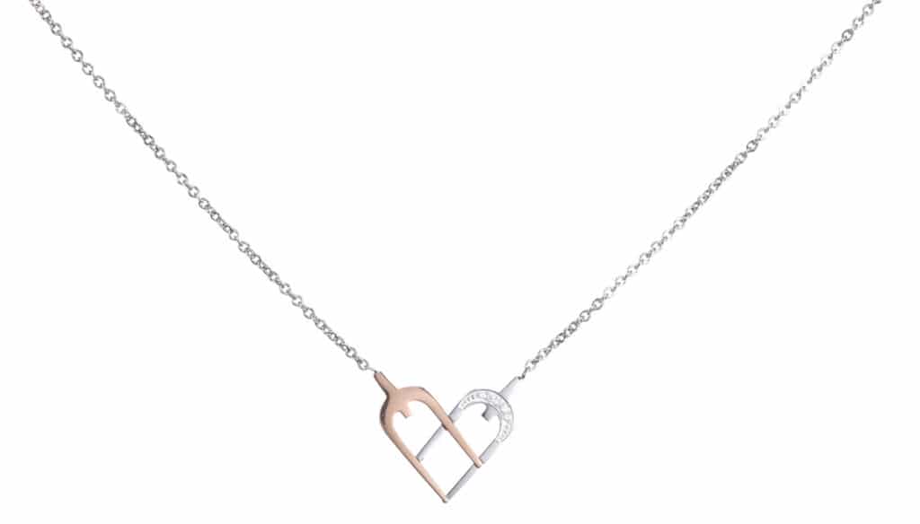Engraved two-piece heart pendant detail